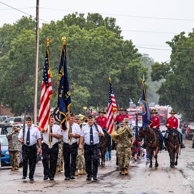 Leading the Parade with our Color Guard
